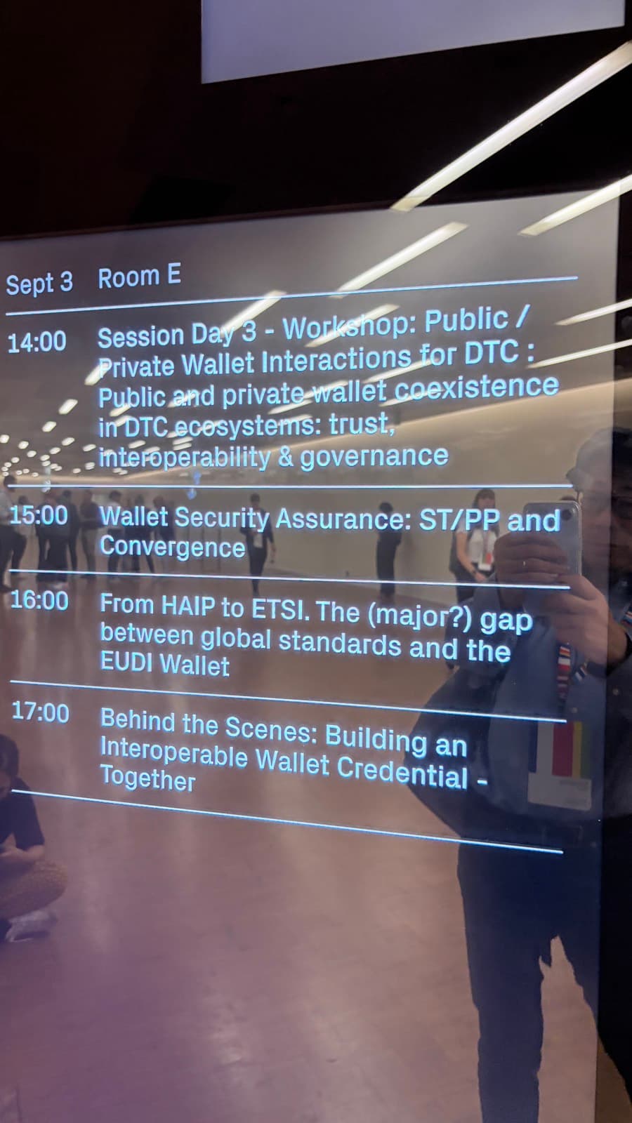 Palexpo Room E schedule board for 3 September, including Wallet Security Assurance at 15:00